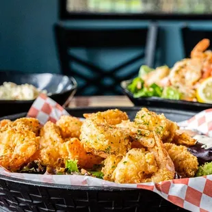 a basket of fried shrimp