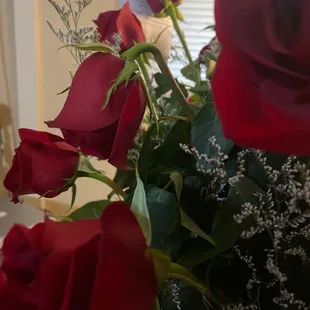 My three day old roses :( Many of them are drooping like this and actually arrived that way.