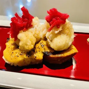 Fried cod over foie gras butter toast
