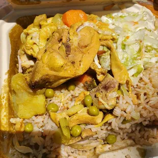 Curry chicken, peas and rice and steamed veggies