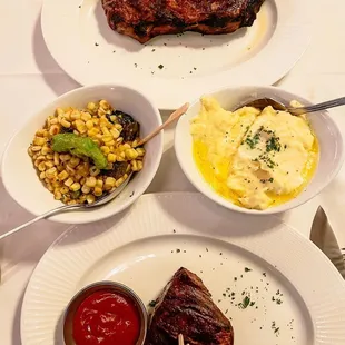 Ribeye, corn sauté, mashed potatoes, filet and steak sauce