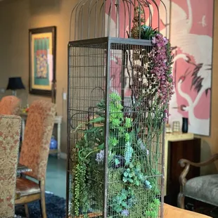 Artificial succulents and flowers.