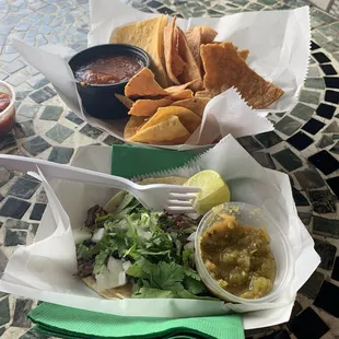 My carne asada taco with habanero salsa and chips and regular salsa.