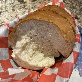 Table bread - it comes in the basket inside a plastic bag &amp; you can take home the leftovers.
