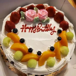 Mixed Fruit cake with whipped cream
