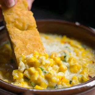 Creamed Indiana Sweet Corn topped with Basil, served with house Focaccia