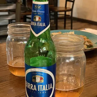 a bottle of pizzeria