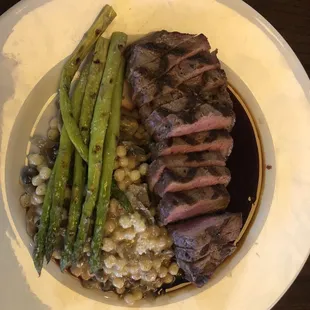 KC Strip steak with asparagus and a mushroom fregula medley!