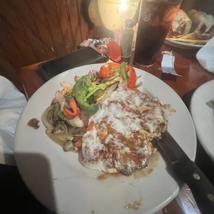 veal extremely tough. Overcooked like leather. Sauce was watery.This was disgusting. Vegetables were like Mexican fajita vegetables.