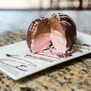 a chocolate and pink ice cream cake