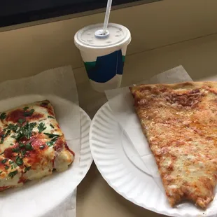 Two slices and small Pepsi
