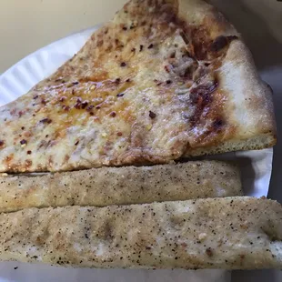 $2.50 slice $1.00 3 piece of garlic stick.