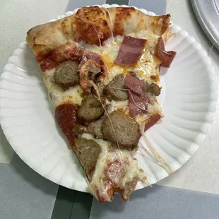 Slice of meat lover pizza.