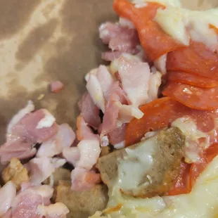 Raw bacon in my Stromboli!