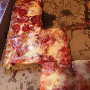 Large Sicilian half plain, half real pepperoni. Doesn&apos;t last long around my family!