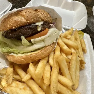 (#11) 1/2 Pound Cheeseburger Fries 20oz Soda