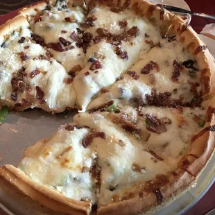 The Everything but the Kitchen Sink (no anchovies) on pan crust.