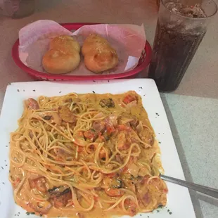 Chicken carbonara with breaded chicken, bread and Ice cold Pepsi