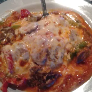 Sausage and Peppers smothered in mozzarella!  Great food!