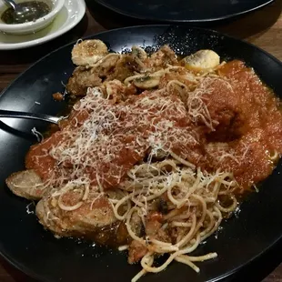 Spaghetti with the works (meat sauce, sausage and meatballs)