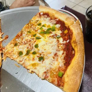 two slices of pizza on a tray