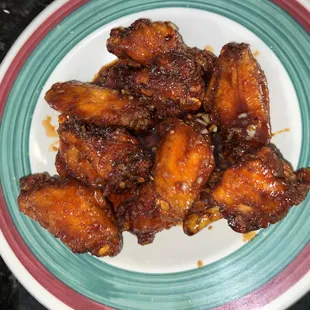 a plate of chicken wings
