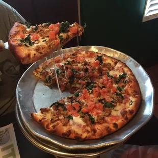The Margherita pizza came with eggplant, spinach, and tomatoes!