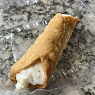 Cannoli. Delicious filling, unfortunately soggy, inedible shell.