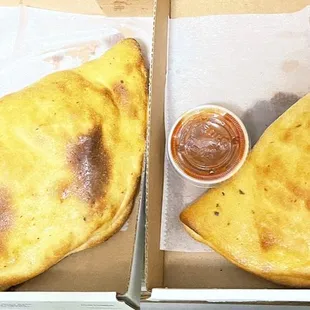 Calzones-deluxe for me and meat for Ernie
