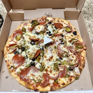Small Supreme pizza - removed the mushrooms and added jalapeños