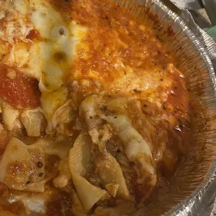 Lasagna - thin layer of noodles with greasy sauce bath.