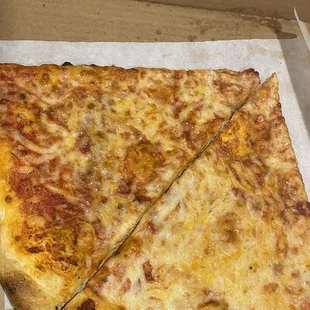 Cheese pizza with overcooked cheese