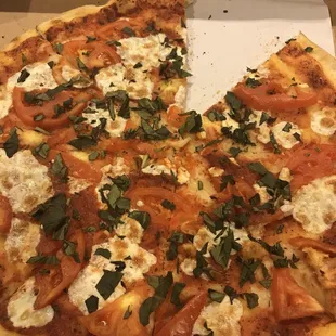 Margharita Pizza-they were heavy with the basil but pretty stingy with the mozzarella and sauce.