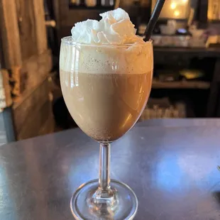 a drink with whipped cream