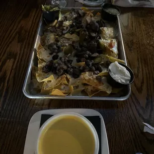 steak nachos + side of queso