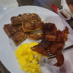 French toast sticks,  scrambled eggs, bacon