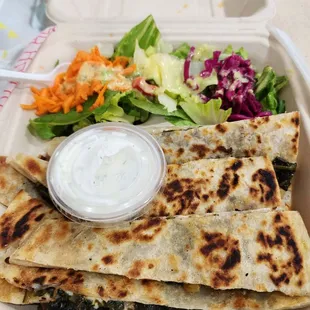 a salad and quesadilla