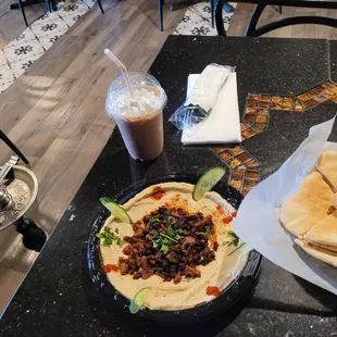 a plate of pita and a drink
