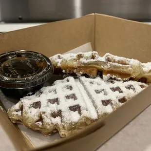 Croffle with powdered sugar and maple syrup (Croissant Waffle)