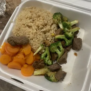 a meal in a styrofoam container