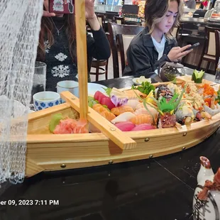 a woman eating sushi