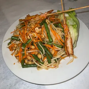 a plate of noodles and vegetables