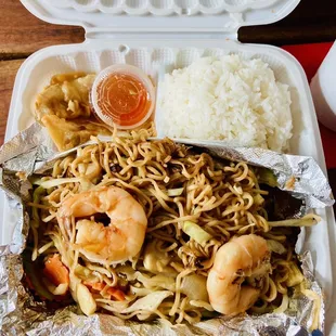 shrimp and noodles in a styrofoam container