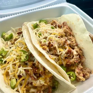 Look at these BEAUTIFUL tacos!  Chorizo, egg, cheese, and fresh jalapeños wrapped in the living arms of warm flour tortillas.