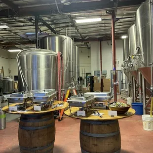 two wooden barrels in a brewery