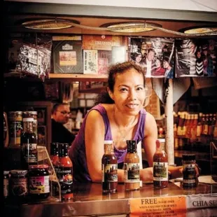 a woman behind the counter