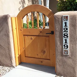 Arch top with raised panel on lower section.