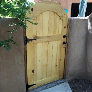 Pine entry gate, arch top.