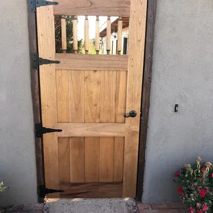 Pine entry gate, mortise and tenon joinery, keyed entry handle.
