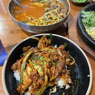 Spicy Pork (Belly) over rice. And spicy beef soup.